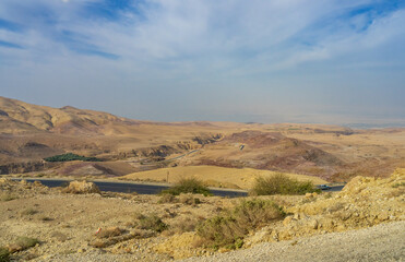 Arid landscape in Jordan on the road from the Dead Sea to Mount Nebo in the desert area of the country