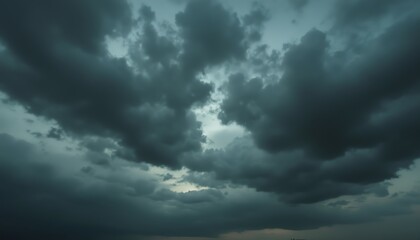 Fototapeta premium Dramatic dark clouds in a moody sky.