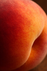 Peach skin closeup with soft texture and natural orange-red gradient