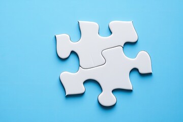 Two white puzzle pieces joined (1)
