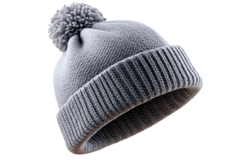 Cozy Winter Hat: A close-up shot of a stylish knit hat, with a fluffy pom-pom on top, suggesting warmth and comfort.
