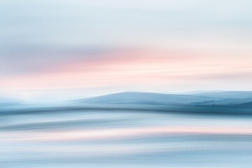 Obraz premium Soft pastel hues paint a serene landscape, blurred by motion, evoking a tranquil morning