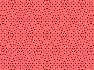 A repeating pattern background. Small dark dots are arranged on a coral-colored background in a regular, organized grid.