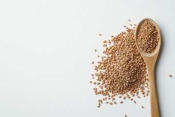Wheat seeds in a wooden spoon