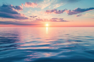 Obraz premium Serene sunset over a tranquil ocean