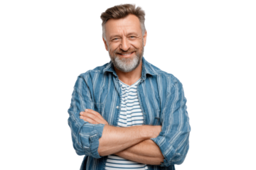 Smiling Man with Arms Crossed: An older man with a silver beard wearing a striped shirt and denim jacket crosses his arms in a portrait, radiating contentment and confidence.