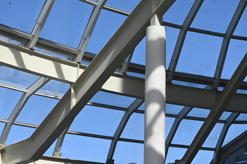 Abstract view of steel grid holding skylight on a skyscraper in an abstract view showing the lines and patterns of the gridwork on a beautiful spring day_20250419_DSC_3650