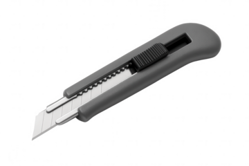Utility knife with stainless steel blade and gray textured handle isolated on transparent background