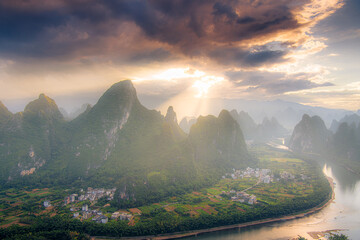 Panoramic sunrise over the Karst mountain natural landscape from Xianggong Mountain, with cloudy sky