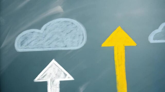 Hand drawing yellow arrow pointing up on chalkboard with clouds and white arrow upward sign