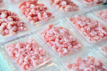 Glimmering under soft natural light, the shrimp meat reflects a balance between freshness and tranquility, showcasing the quality of Taiwanese fishing industries and traditional seafood delicacies.