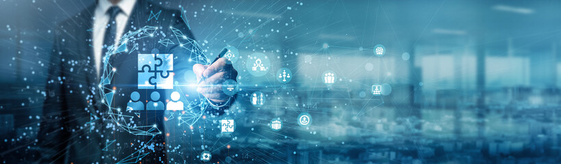 A hand of a businessman drawing graphs symbolizes how teamwork transforms individual ideas into shared success, blending collaboration, strategy, and innovation to achieve collective goals.
