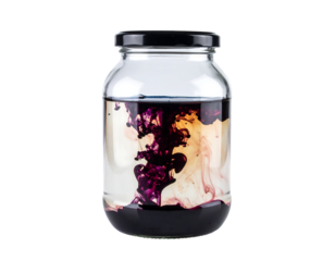 Swirling Purple and White Liquid in Glass Jar