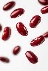 Red Beans Scattered and Hovering on White