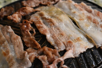 pork barbecue on frying pan, Thai style cuisine
