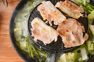 pork barbecue on frying pan, Thai style cuisine