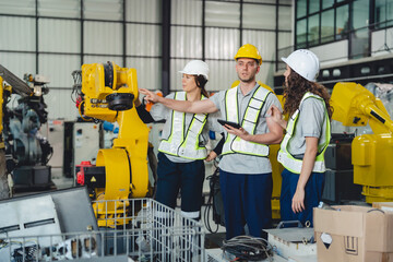 Technician Engineer in Factory, Maintaining and Repairing Robotic Arms Machinery, Ensuring Smooth...
