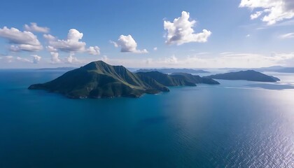 Aerial view showcases serene islands surrounded by turquoise waters under cloudy skies