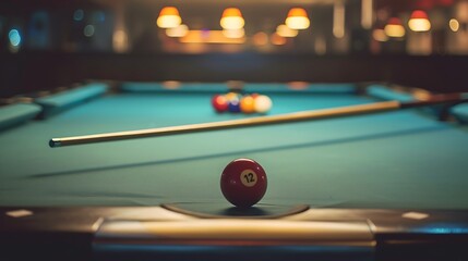 Close Up View Of Billiard Table With Red Ball In Focus And Cue Stick Above