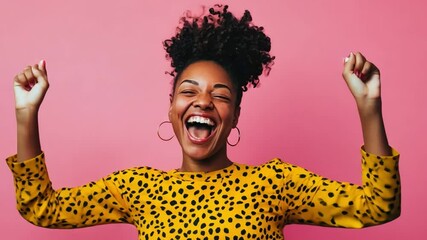Joyful Embrace: A woman, radiating happiness, throws her arms up in a gesture of triumph, her face alight with pure joy against a vibrant pink backdrop.