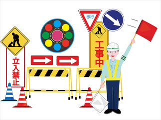工事現場で交通誘導員が車に注意を促している。