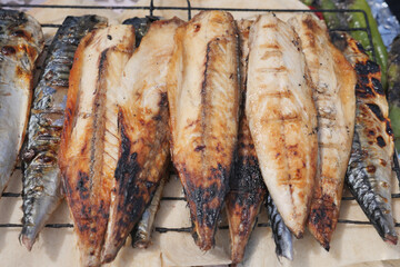 Grilled fish prepared at a local market in summer