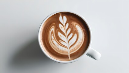 A coffee cup on a brown wooden table with cappuccino foam and heart art