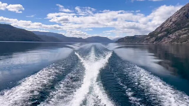 Lago Lacar Quila Quina in Argentina, captured from a boat's wake on a serene lake