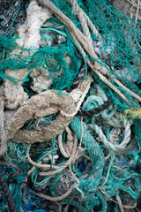 Tangled Fishing Nets and Ropes in a Pile