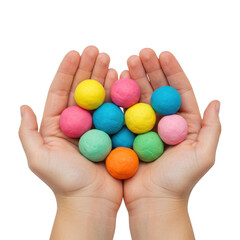 Hands holding colorful play dough balls isolated on transparent background