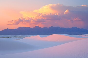 Sunset over white sands and dramatic clouds