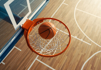 Basketball going through hoop