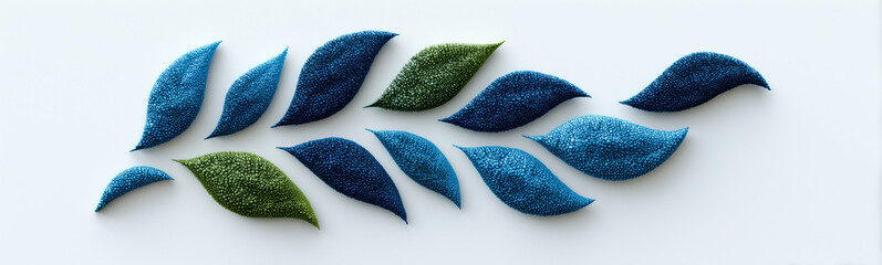 Obraz premium Leaf Arrangement: An elegant, visually appealing arrangement of stylized leaves in varying shades of blue and green, representing growth and harmony.
