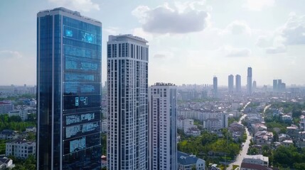 Obraz premium Modern skyscrapers in a vibrant city landscape.