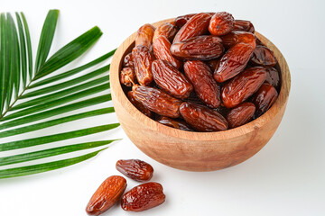 Dates fruit tunisia, Tunisian honey dates, in bowl isolated on white background