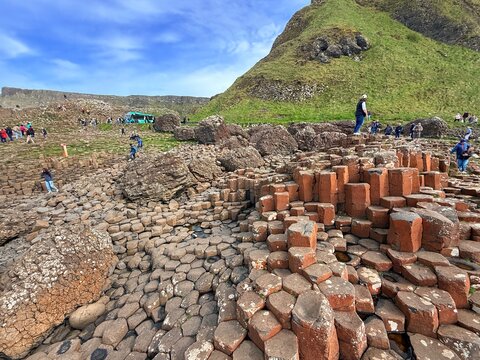 The Giant's Causeway, a UNESCO World Heritage Site on Northern Ireland's Antrim Coast, features 40,000 interlocking basalt columns formed by volcanic activity. Its hexagonal stones and coastal beauty 