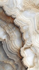 Intricate patterns of natural stone showcase soft hues and flowing lines in elegant formation