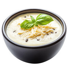 creamy soup in black dish  