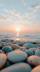 Sunrise beach pebbles ocean calm