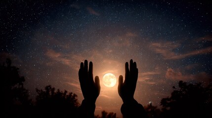 Hands raised in prayer against a starry night sky