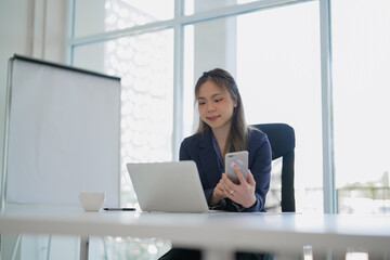 Businesswoman working with data spreadsheet documents at workplace