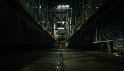 Dark Industrial Corridor with Metal Beams and Lights with Grunge Factory Interior