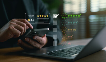 Businessman using smartphone to leave 5-star customer review rating. Concept of customer...