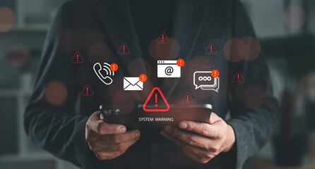 Man holding smartphone with system warning alerts. Concept of cyber threat, phishing, scam messages, suspicious calls, and online security risks on mobile communication.