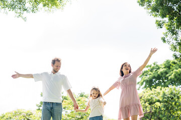 Fototapeta premium Happy family parent children having picnic outdoor activity. Enjoy happiness moment summer playing together including father mother son and daughter relaxing in the morning sunrise.