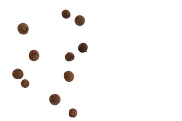 Peppercorns on white surface, minimalist composition, top view with copy space