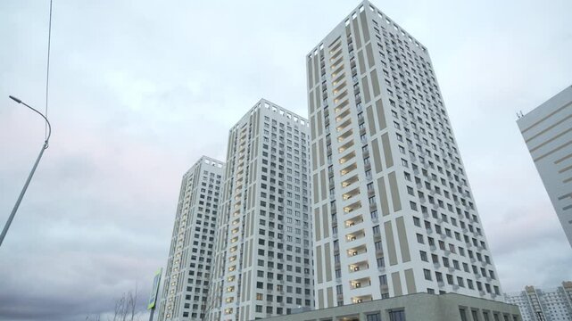 Elevated apartment edifices rise above displaying sleek aesthetic with geometric precision. Buildings represent contemporary metropolitan expansion