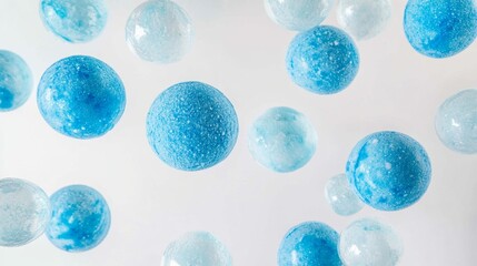 Refreshing blue bath bombs floating on white background perfect for spa day relaxation aromatherapy and skincare promotions 