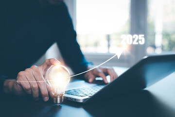 Naklejka premium Businessman holding virtual cost growth chart with upward arrow. Concept of rising expenses, financial analysis, business performance, and economic strategy.