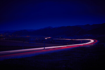 Streaking traffic on mountain highway, Colorado